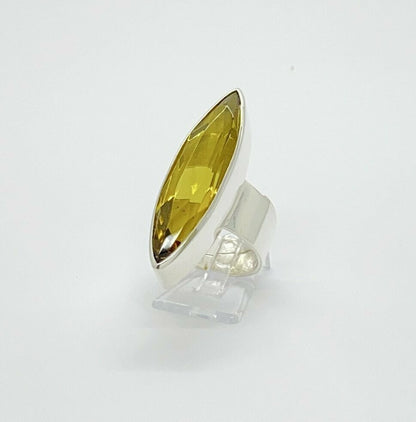 Silberring mit goldbraunem Obsidian, 1 × 4 cm, handgefertigt in Deutschland.