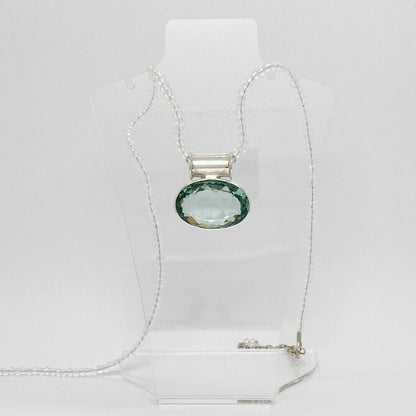 Silberanhänger Obsidian meerblau Oval, 3 × 2 cm, an zarter Silberkette.