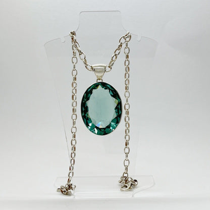 Silberanhänger mit ovalem meerblauen Obsidian, 4 × 3 cm, an silberner Gliederkette