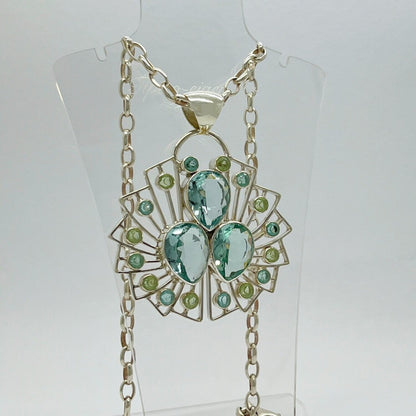 Anhänger Sea Rose aus Silber mit facettierten Obsidian meerblau- und lichtgrünen Steinen in Rosen-Design.