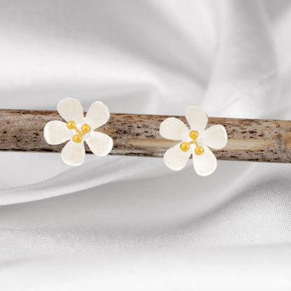 MadamLili Butterblumen Ohrstecker aus 925er Silber mit 18k vergoldeter Mitte.