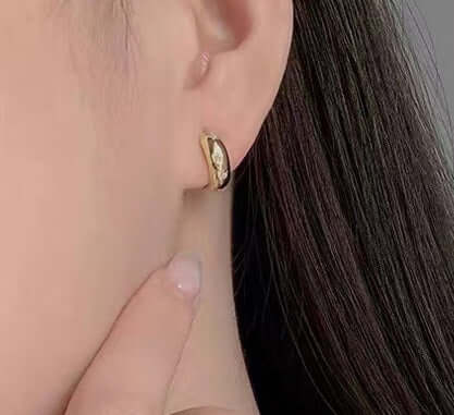 Creolen aus 925 Silber mit Zirkonia im Asterismus-Look - Perla d'Oro