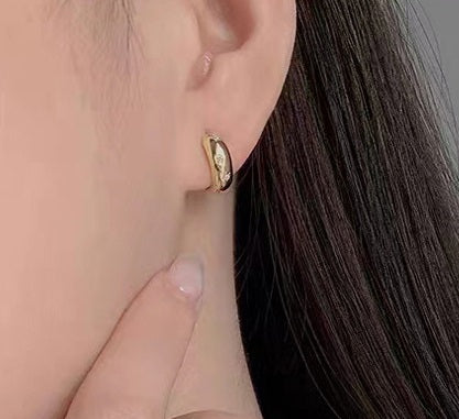 Creolen aus 925 Silber mit Zirkonia im Asterismus-Look - Perla d'Oro