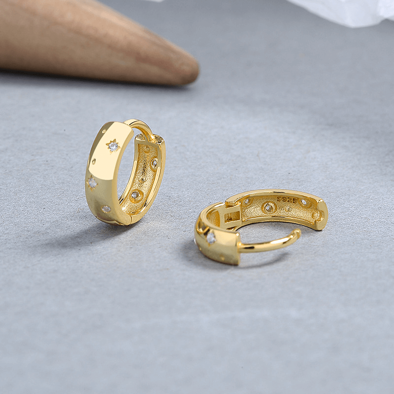 Creolen aus 925 Silber mit Zirkonia im Asterismus-Look - Perla d'Oro